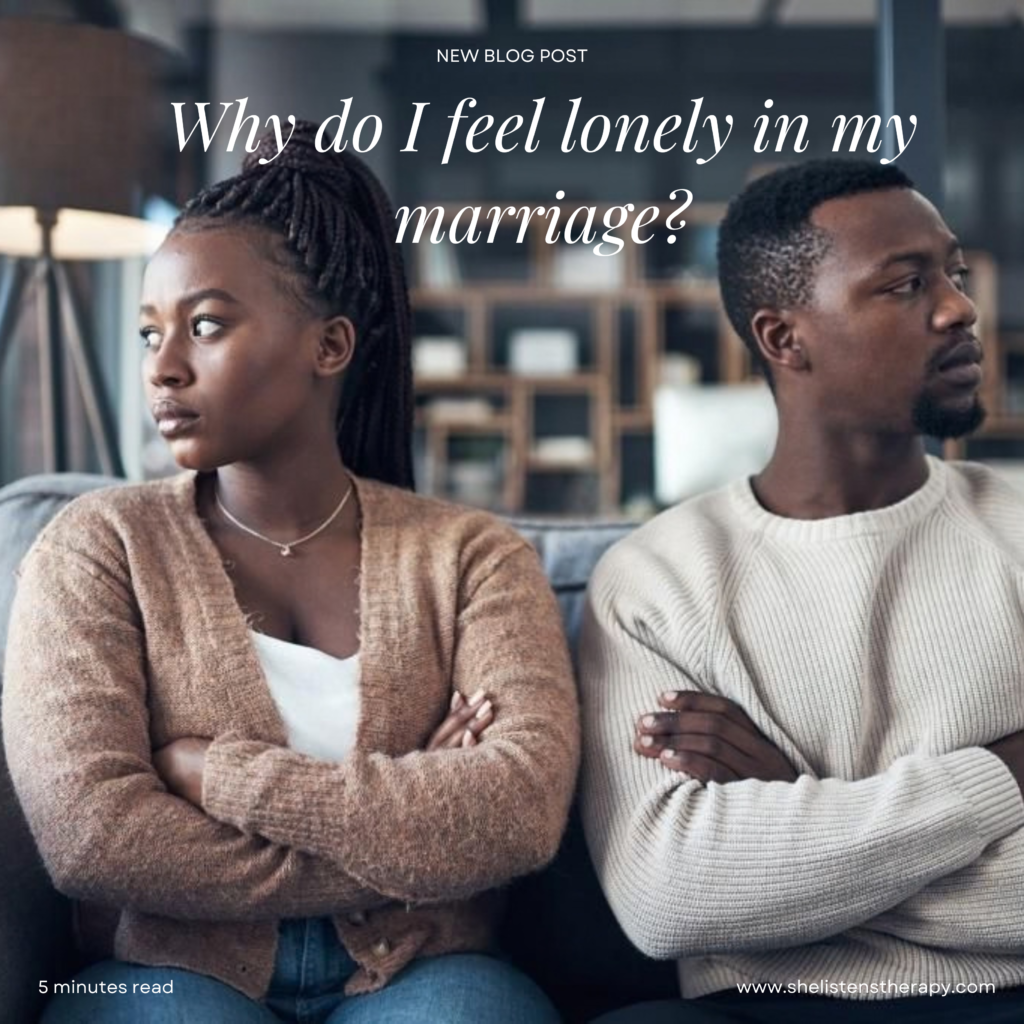 A couple sitting apart in silence, representing emotional loneliness in marriage